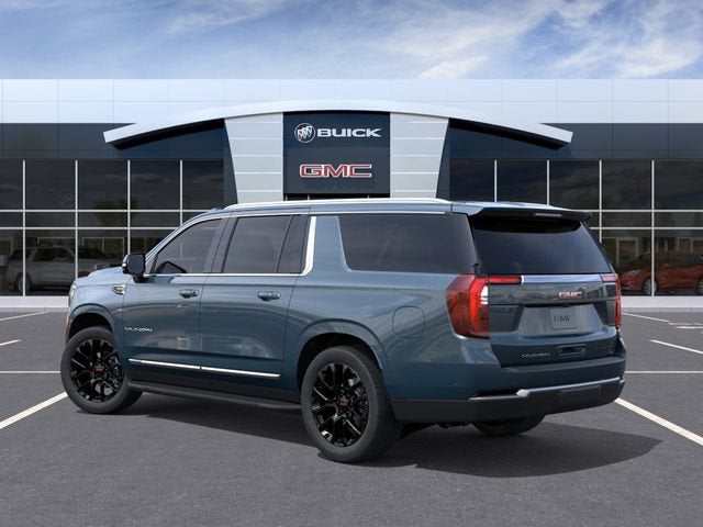 2026 GMC Yukon XL — rear three-quarter view